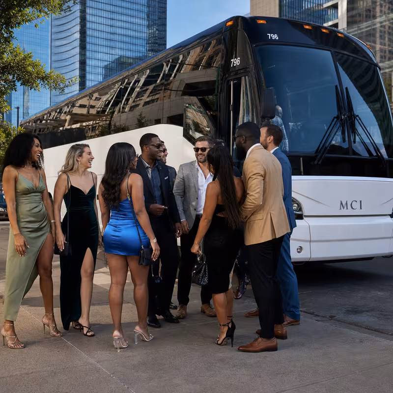 Passengers loading luggage while boarding an Dallas group shuttle