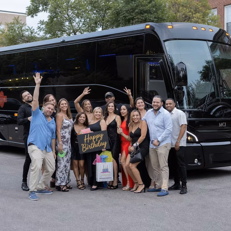Party bus interior with wraparound leather seating and LED lighting in Dallas
