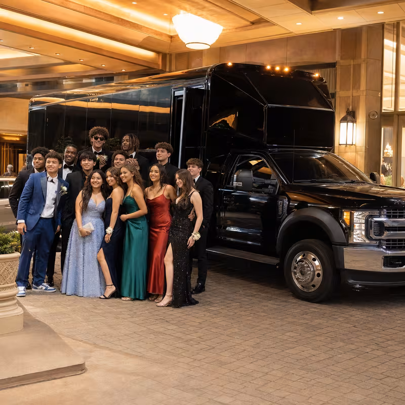 Party bus interior with wraparound leather seating and LED lighting in Dallas