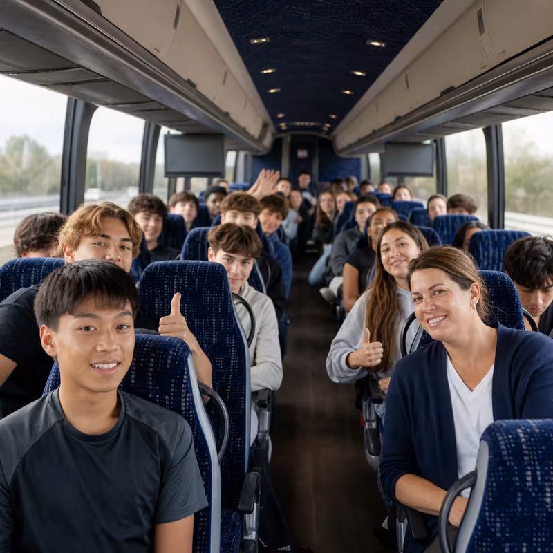 Group boarding a white charter bus for School Transportation transportation in Dallas