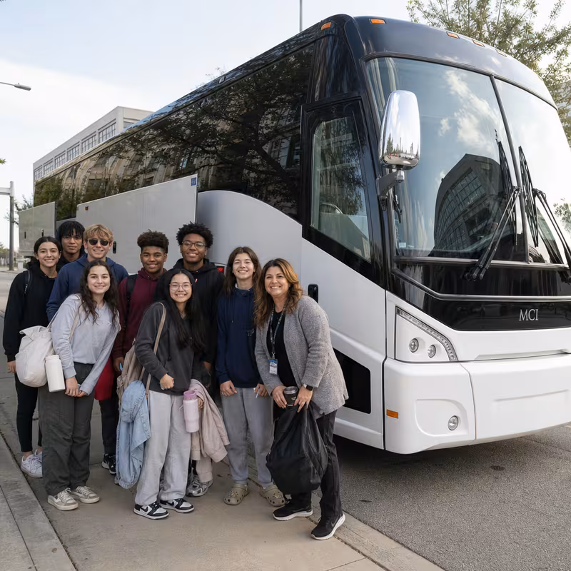 Passengers loading luggage while boarding an Dallas group shuttle