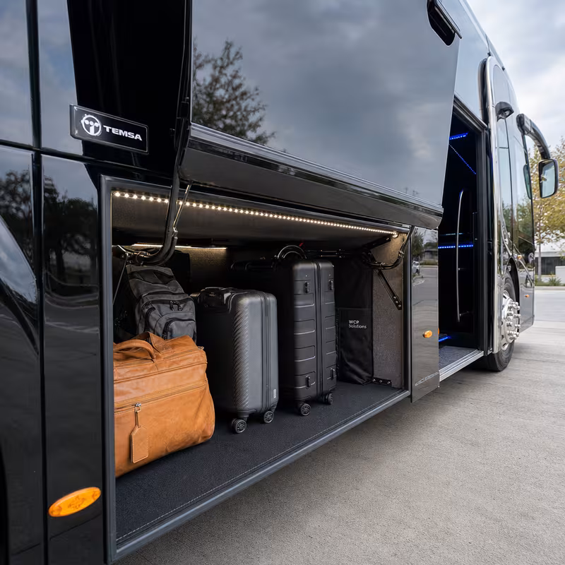 Party bus interior with wraparound leather seating and LED lighting in Dallas